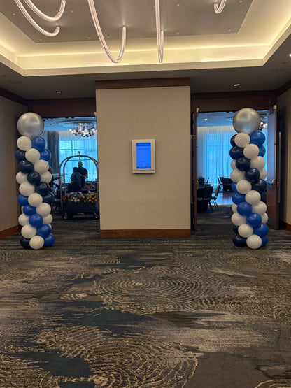 Balloon column in a room with a carpeted floor