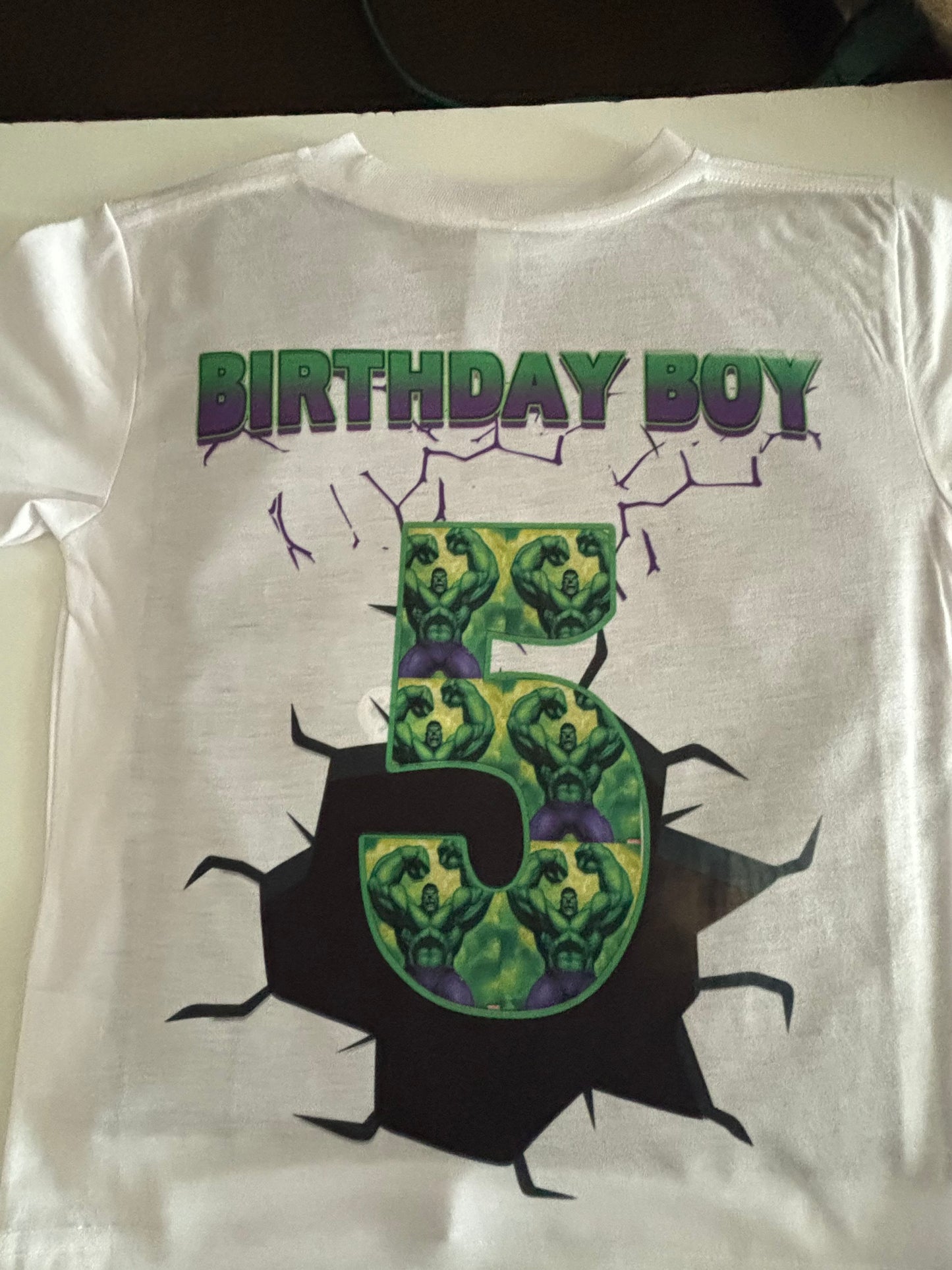 Custom birthday boy shirt with bold cracked age number graphic
